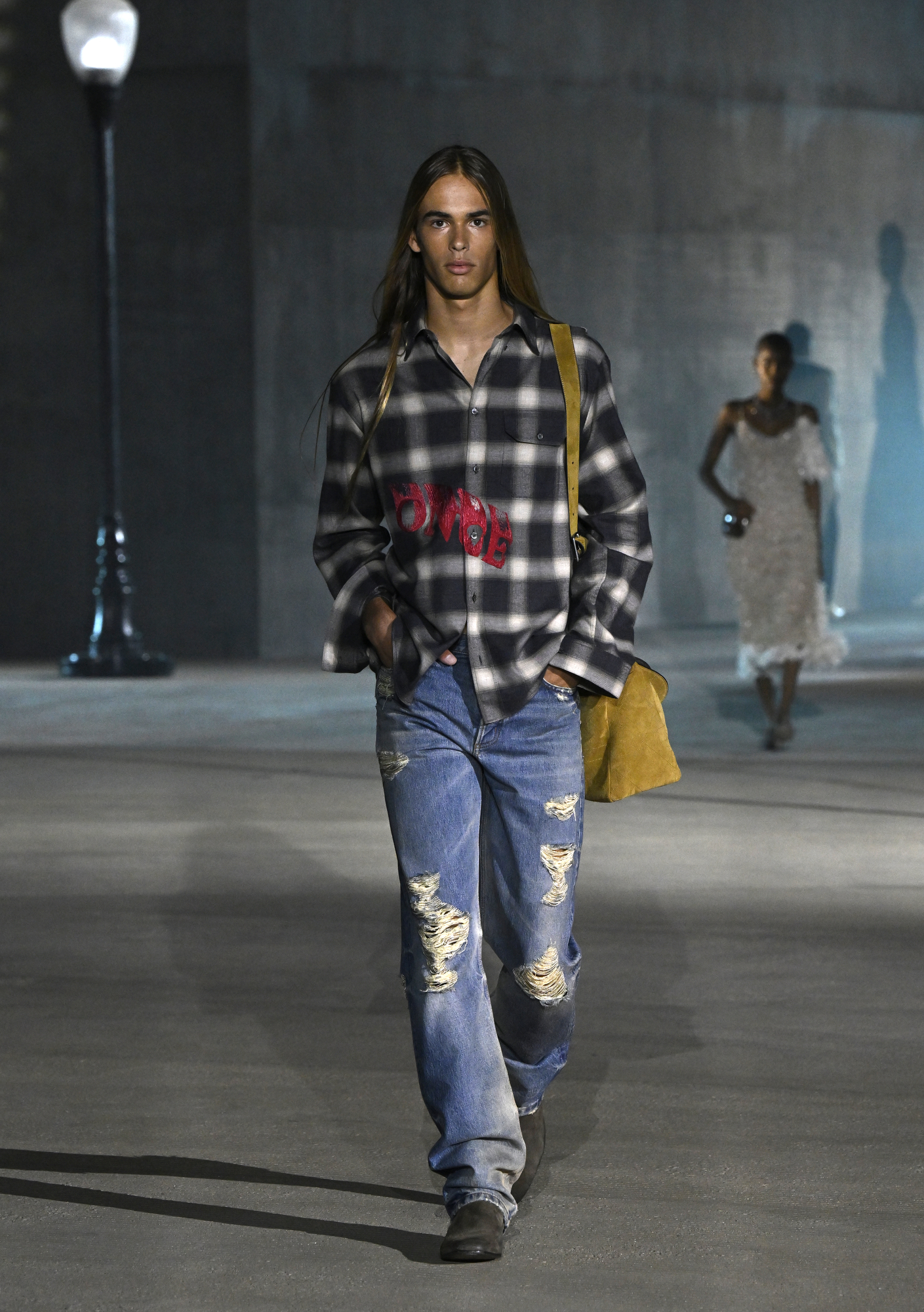 Dior Cruise 2027 — destroyed denim sequence, architectural cuts, Dior Women's under Jonathan Anderson.